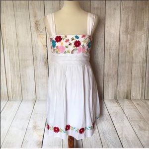 White dress with floral detail